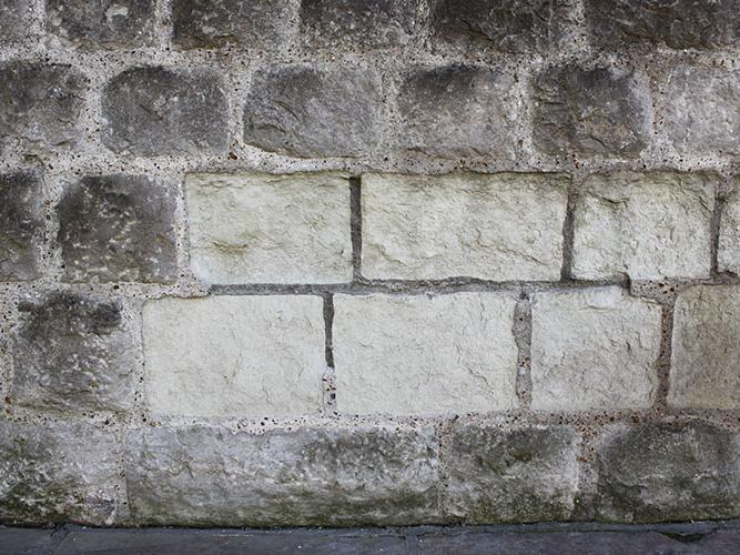 Reigate Stone in the outer curtain wall, Tower of London